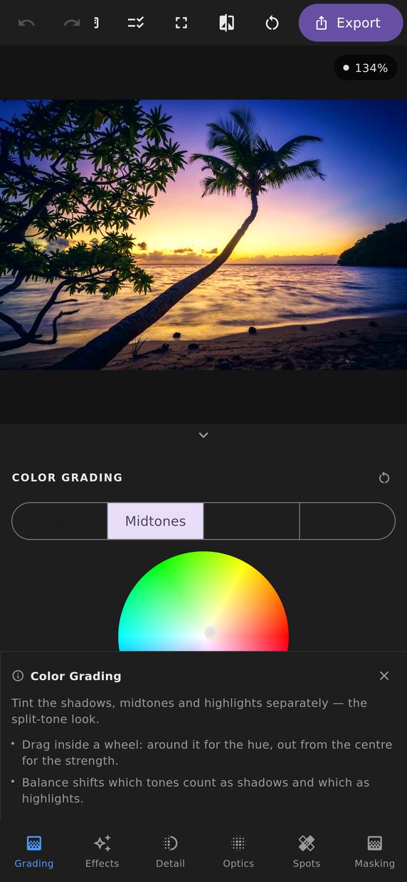 The colour grading panel with four wheels, showing a warm highlight and cool shadow grade